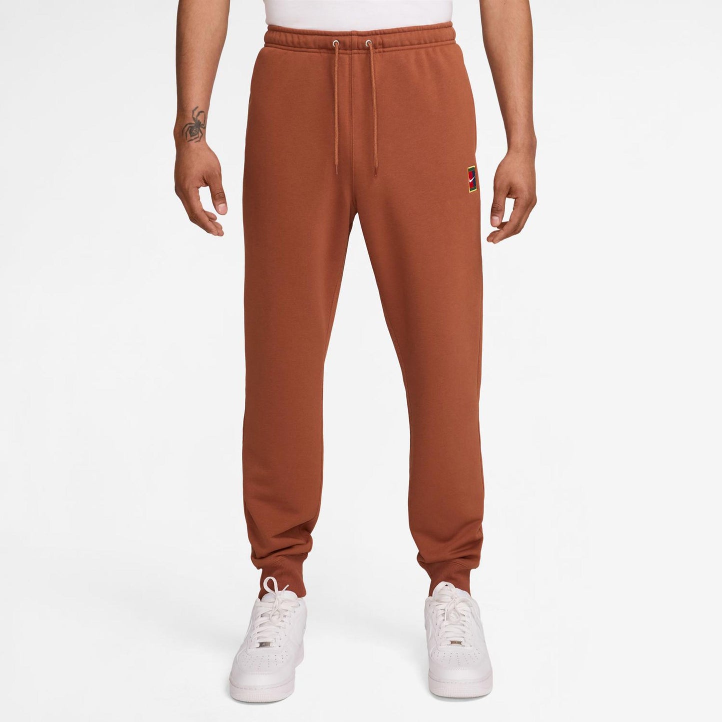 Nike Court Dri-Fit Heritage Fleece Spodnie Dresowe Mężczyźni-Rdza