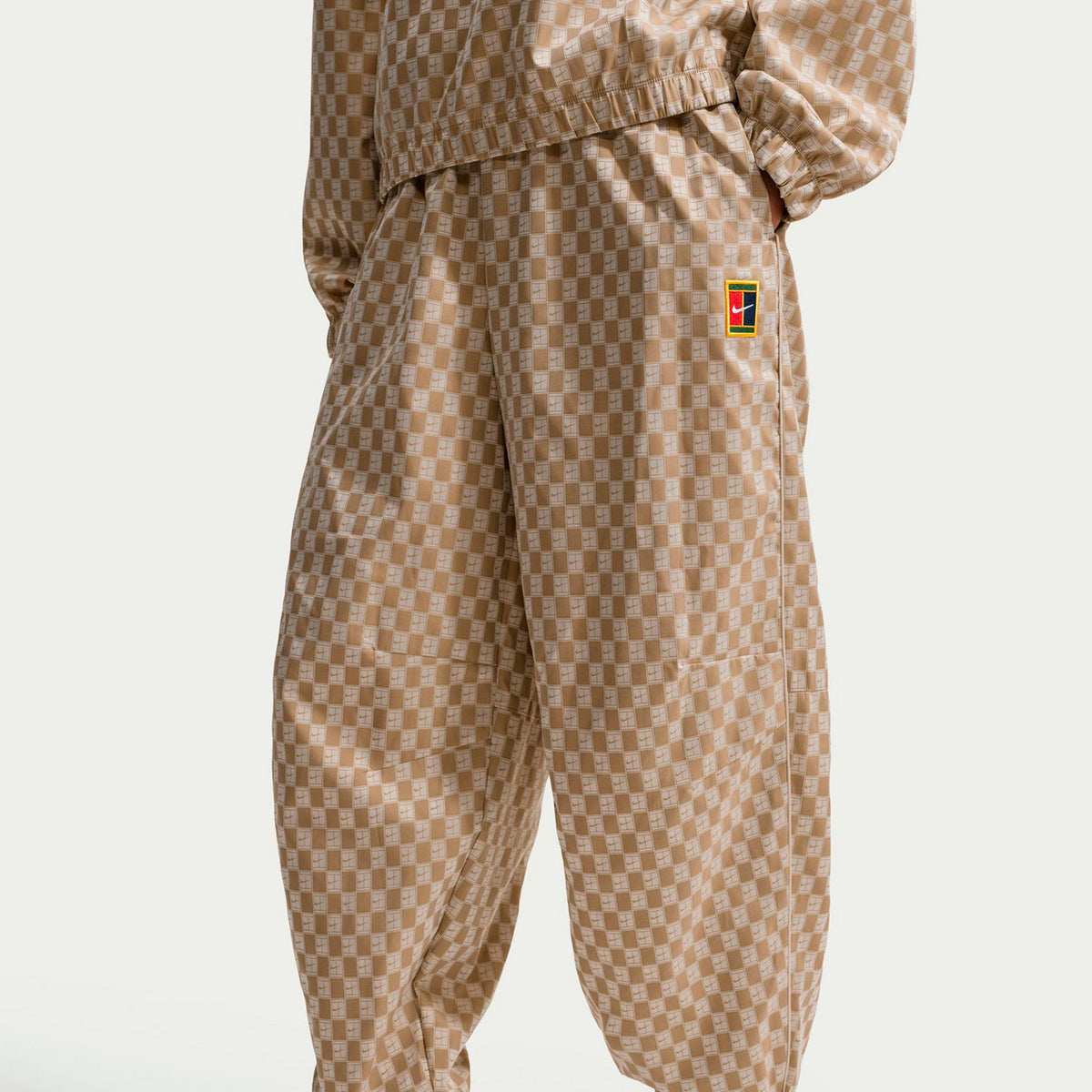 Nike Mid-Rise Oversized Spodnie dresowe Kobiety - beż